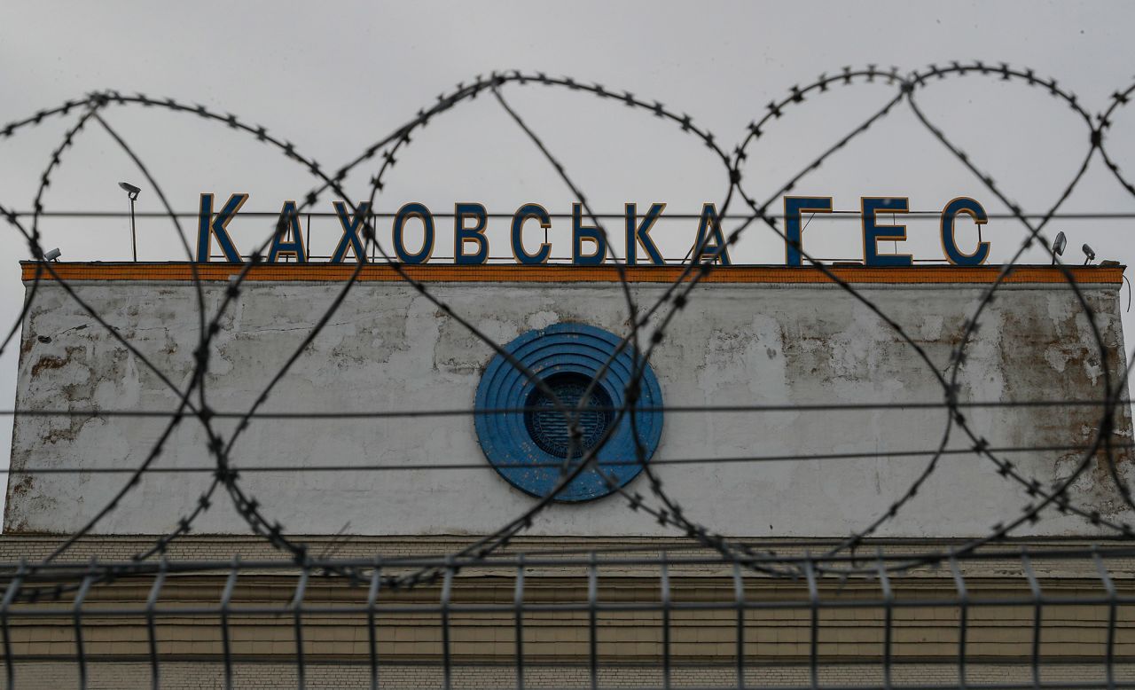 The sign of the the Kakhovka Hydroelectric Power Plant (HPP) in Kakhovka, near Kherson, Ukraine is seen on May 20. 