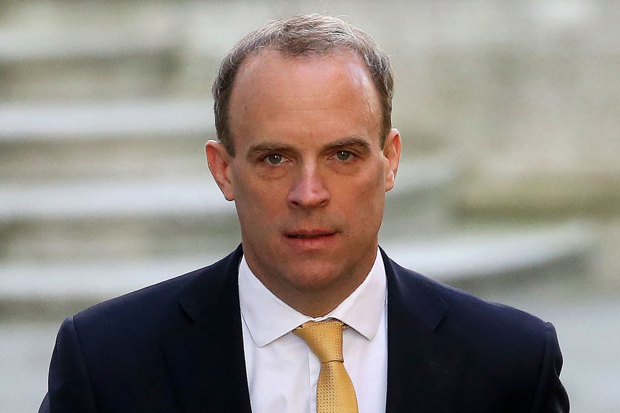 UK Foreign Secretary Dominic Raab walks in central London on April 21.