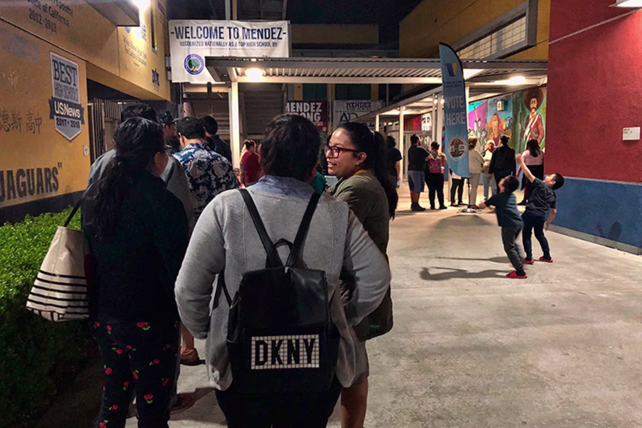 Voters wait to cast their ballots at Mendez High School in the Boyle Heights section of Los Angeles, Tuesday, March 3.