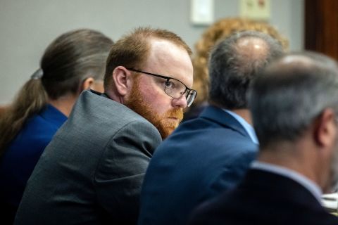 Travis McMichael sits with his attorneys before the start of closing arguments at the Glynn County Courthouse in Brunswick, Georgia, on Monday.