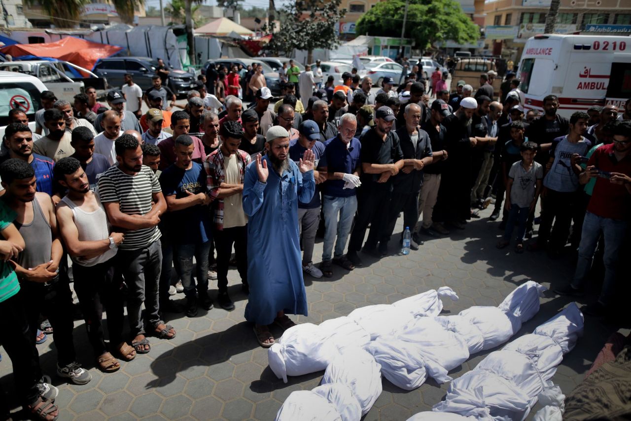 Palestinians mourn their relatives killed in the Israeli bombardment of the Gaza Strip at al-Aqsa Hospital in Deir al-Balah, central Gaza Strip, on June 8. 