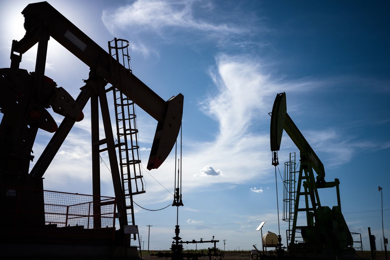 Oil pump jacks are shown in a field on June 27 in Stanton, Texas.?