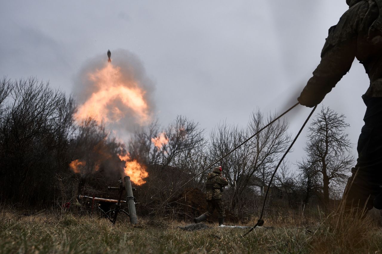 Ukrainian soldiers fire a mortar towards Russian positions Thursday near Bakhmut.