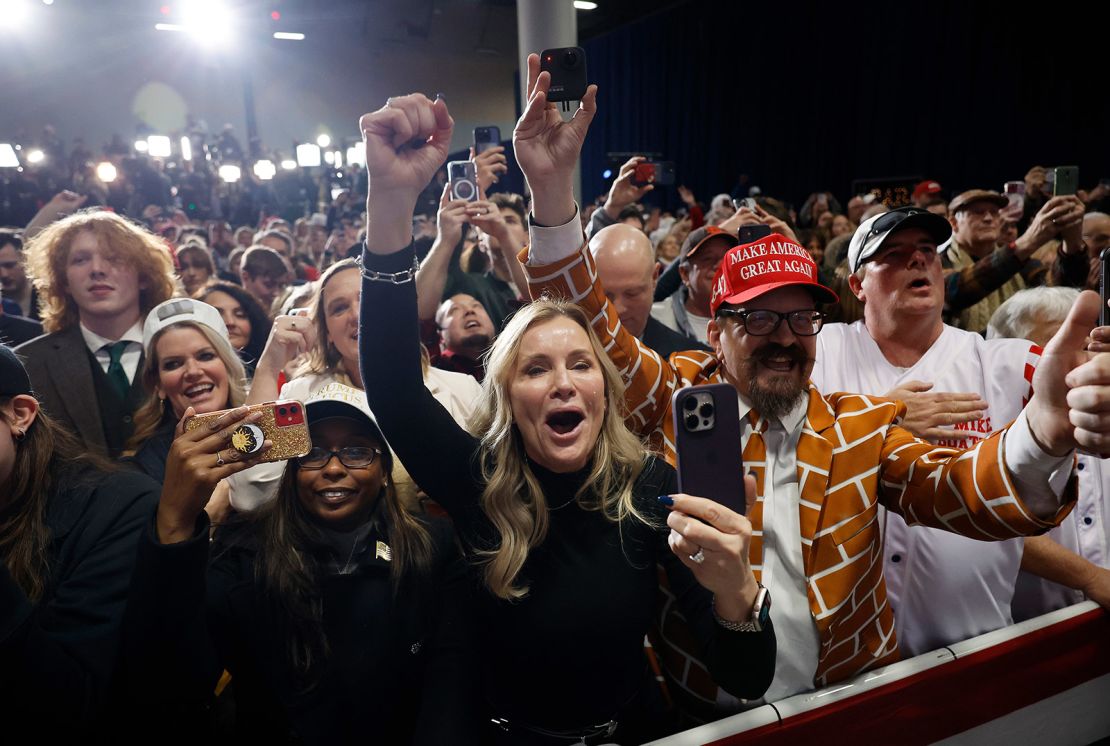 Trump supporters celebrate his victory in Iowa.