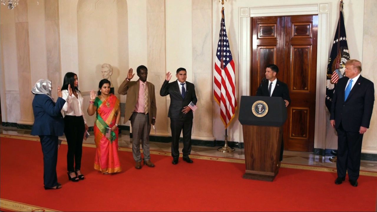 President Trump oversees a naturalization ceremony for five new US citizens.