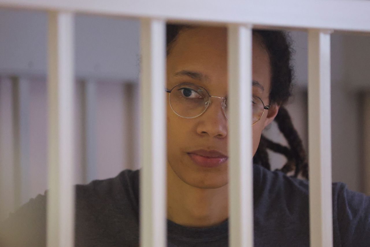 U.S. basketball player?Brittney?Griner stands inside a defendants' cage in court in Khimki, Russia, on August 4.