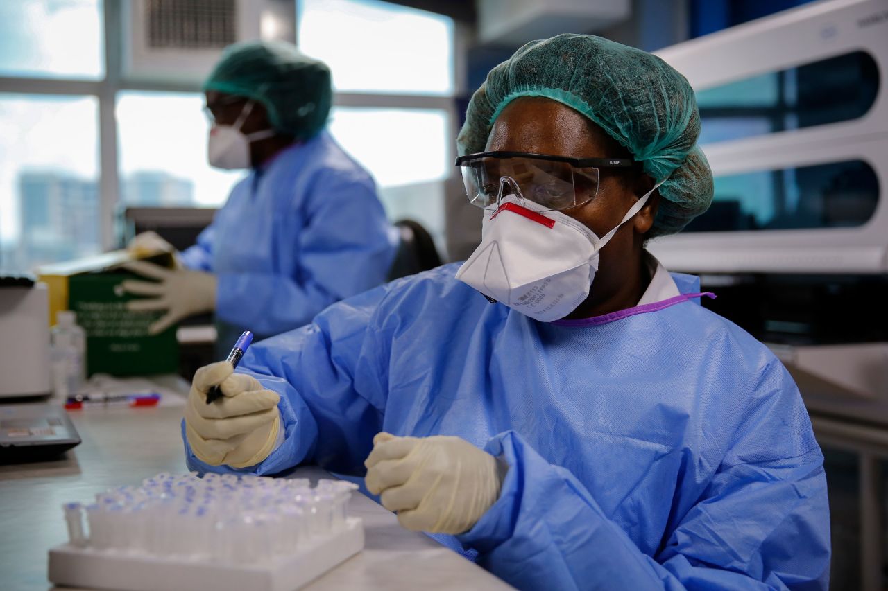 Laboratory technicians test patient samples for coronavirus at the Pathologists Lancet Kenya laboratory in Nairobi, Kenya on April 5. 