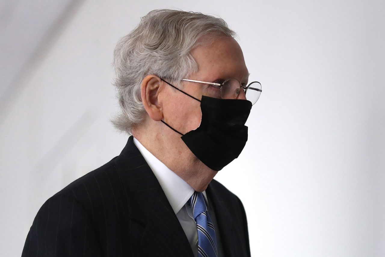 Senate Majority Leader Mitch McConnell arrives for a Republican senate luncheon in the Hart Senate Office Building on Capitol Hill September 16, in Washington.