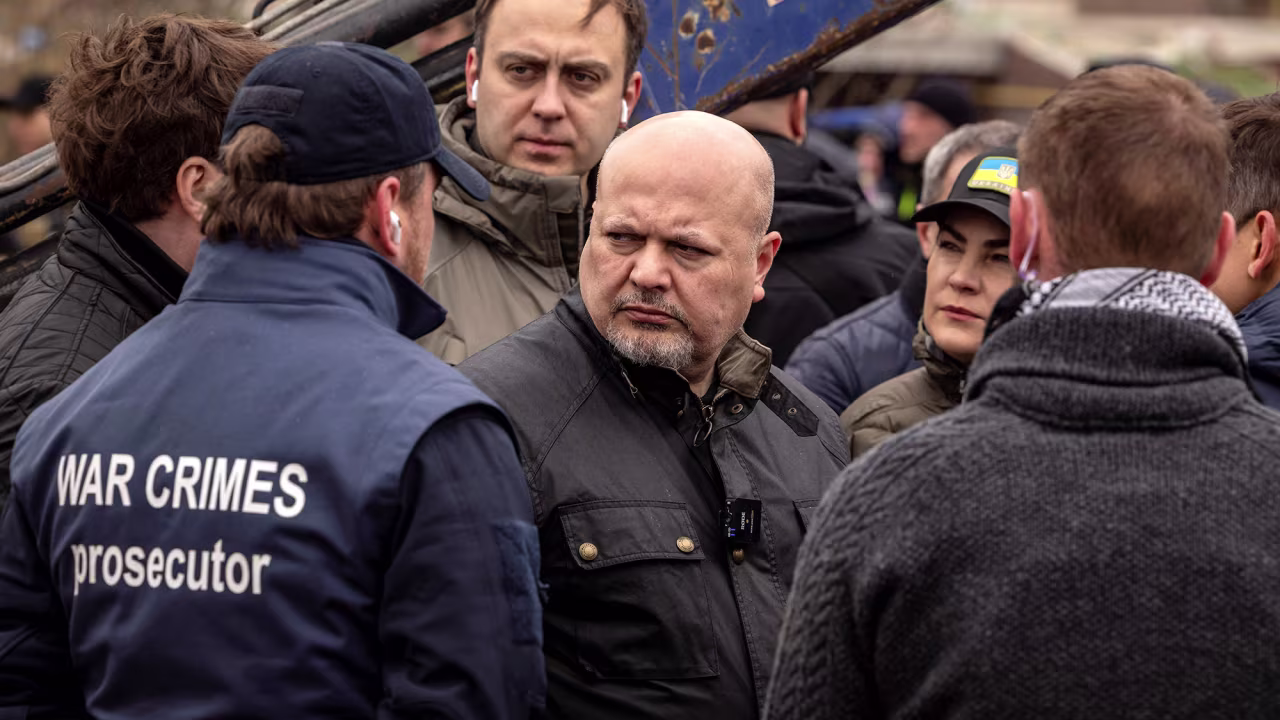 International Criminal Court chief prosecutor Karim Khan visits a mass grave in Bucha, Ukraine on April 13.
