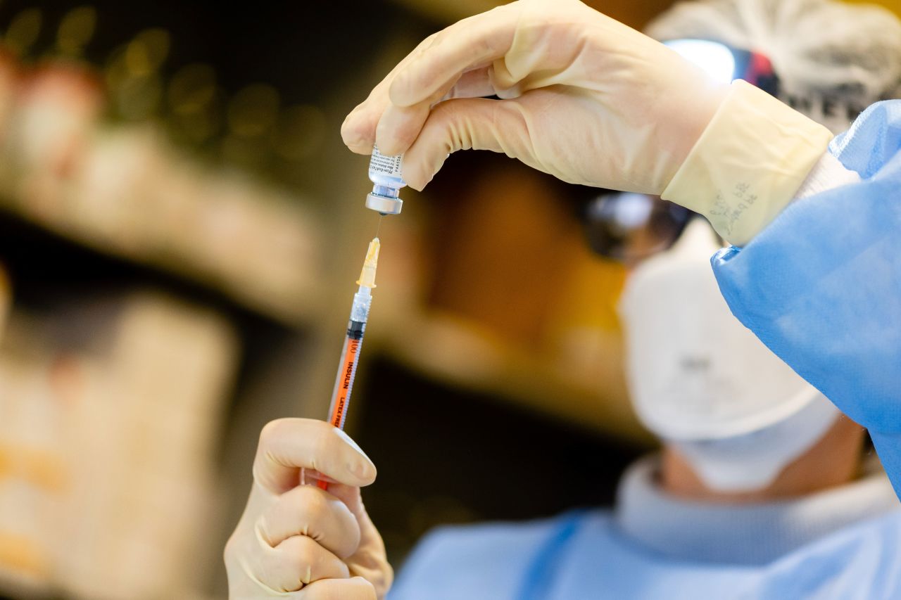 A doctor prepares a dose of the Pfizer/BioNTech Covid-19 vaccine at a hospital in Cremona, Italy, on January 6.