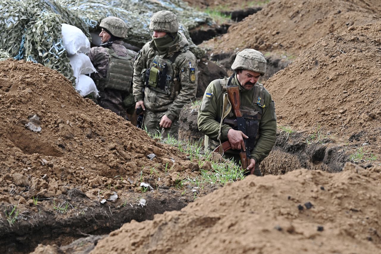 Ukrainian servicemen stand in a trench near Bakhmut, Ukraine, on April 8. 