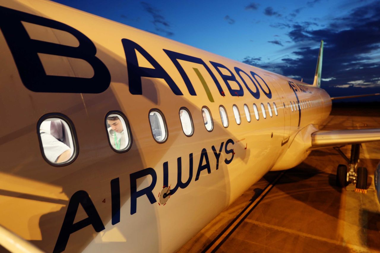 A plane operated by Bamboo Airways stands on the tarmac on the first day of the airline's operations at Phu Cat Airport in Qui Nhon, Vietnam, in January 2019.