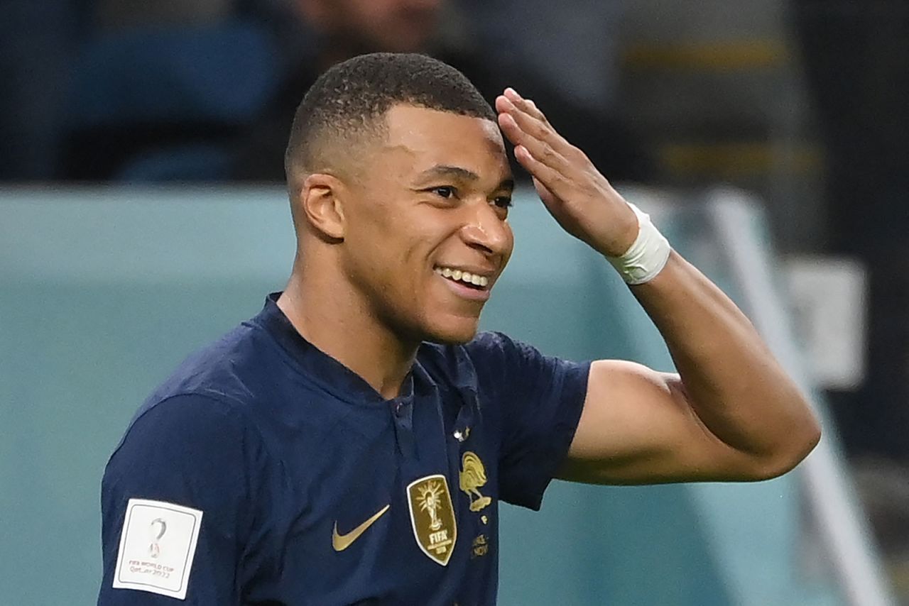 France's forward Kylian Mbappe celebrates after scoring against Australia on November 22.