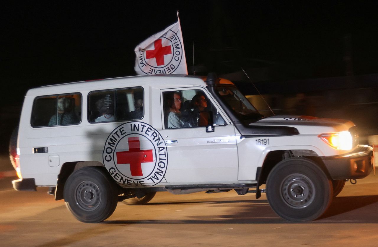 A Red Cross vehicle arrives at the Rafah border amid a hostages-prisoners swap deal between Hamas and Israel as seen from Gaza on November 24.