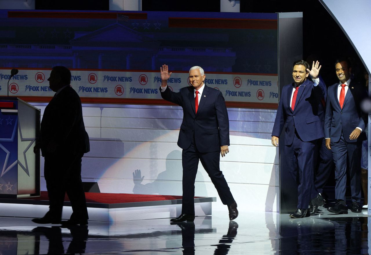 Former Vice President Mike Pence arrives onstage.