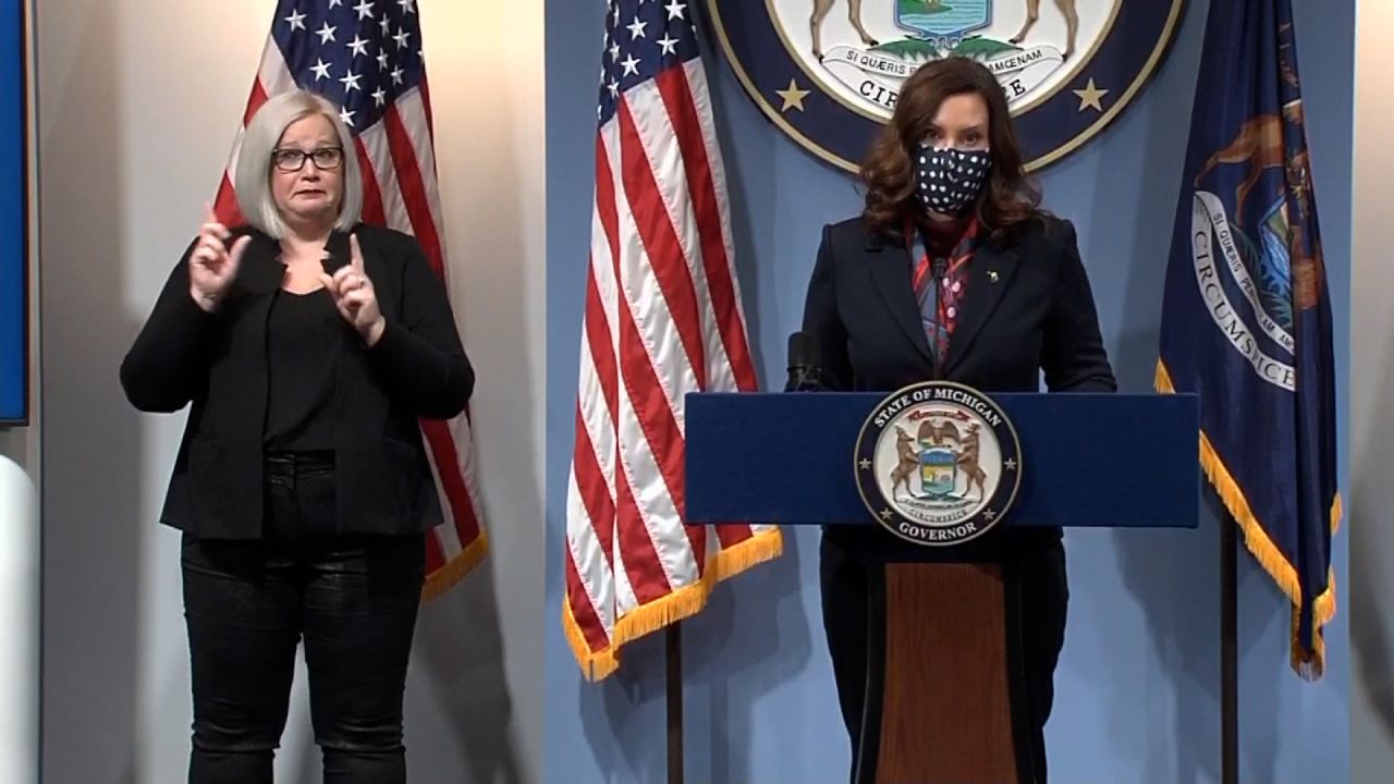 Michigan Gov. Gretchen Whitmer, right, speaks during a press briefing in Lansing, Michigan, on March 2. 