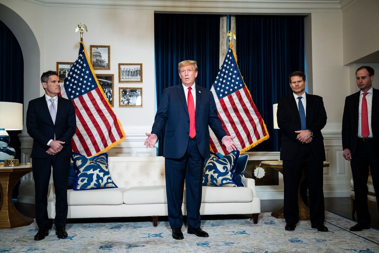 Former President Donald Trump speaks to the media at the Waldorf Astoria hotel after attending his hearing at the DC Circuit Court of Appeals in Washington, DC, on January 9.