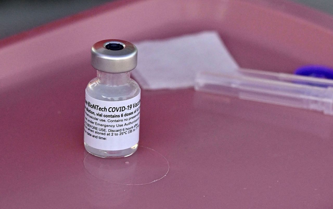 A vial of the Pfizer-BioNTech Covid-19 vaccine is seen at a pop-up clinic in Los Angeles on August 23.