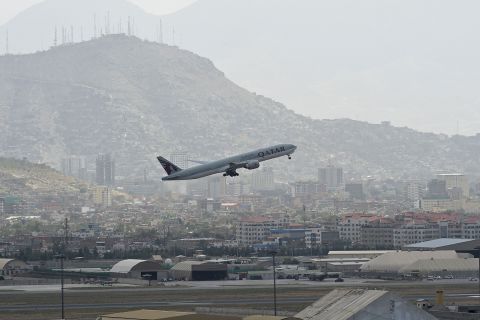 A Qatar Airways aircraft takes off from the airport in Kabul on August 14. 