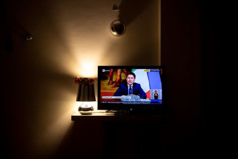 Italian Prime Minister Giuseppe Conte announces plans to loosen lockdown restrictions across the country during a television broadcast on April 26.