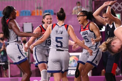 From left, Jacquelyn Young, Stefanie Dolson, Kelsey Plum, and Allisha Gray of Team United States celebrate victory and winning the gold medal in the 3x3 Basketball competition on July 28.