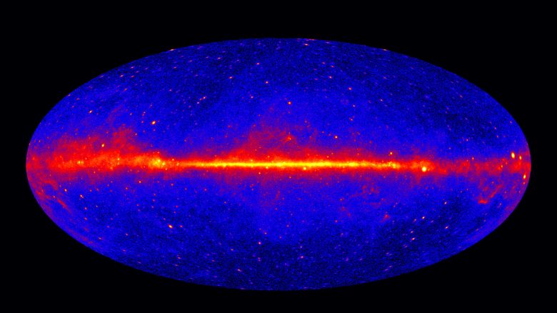 The Fermi LAT 60-month image, constructed from front-converting gamma rays with energies greater than 1 GeV. The most prominent feature is the bright band of diffuse glow along the map's center, which marks the central plane of our Milky Way galaxy. The gamma rays are mostly produced when energetic particles accelerated in the shock waves of supernova remnants collide with gas atoms and even light between the stars. Hammer projection.