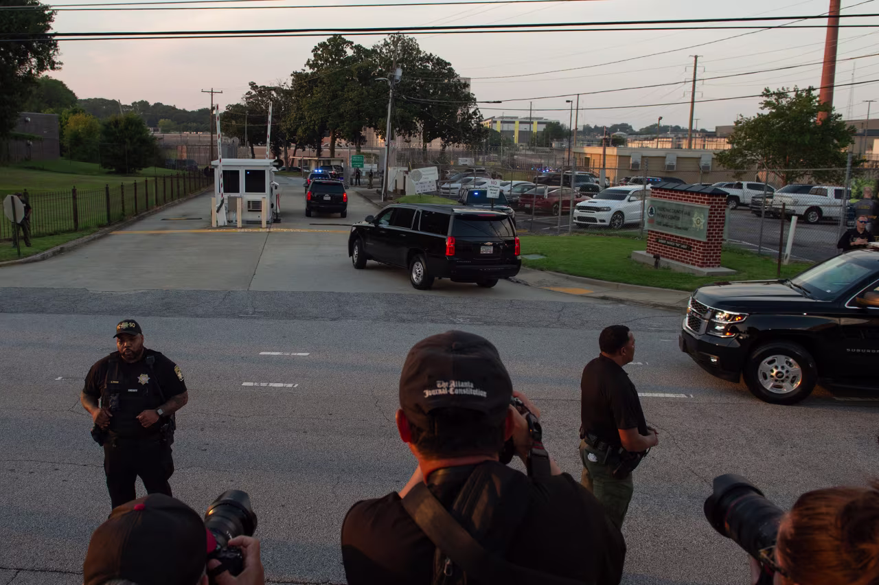 Former President Donald Trump's motorcade drives into Fulton County Jail in Atlanta on Thursday, August 24, 2023.
