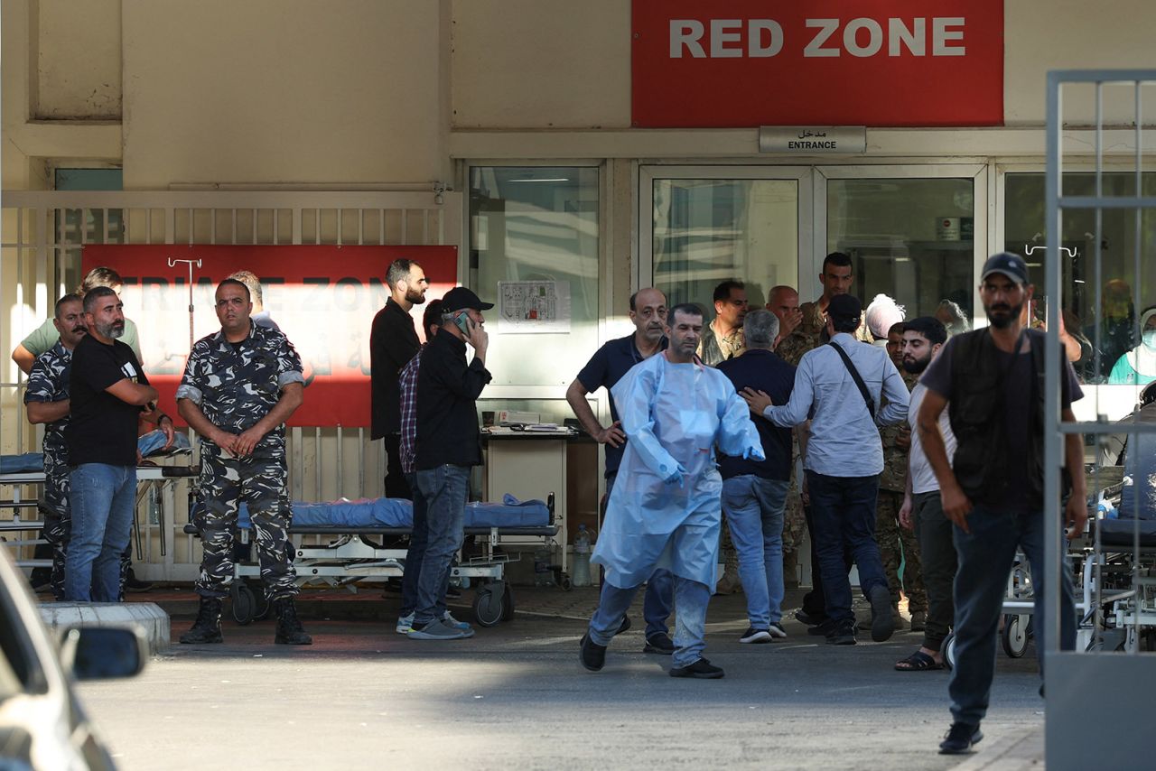 People gather outside a hospital in Beirut, Lebanon, as thousands of people were wounded when the pagers they use to communicate exploded across Lebanon on September 17