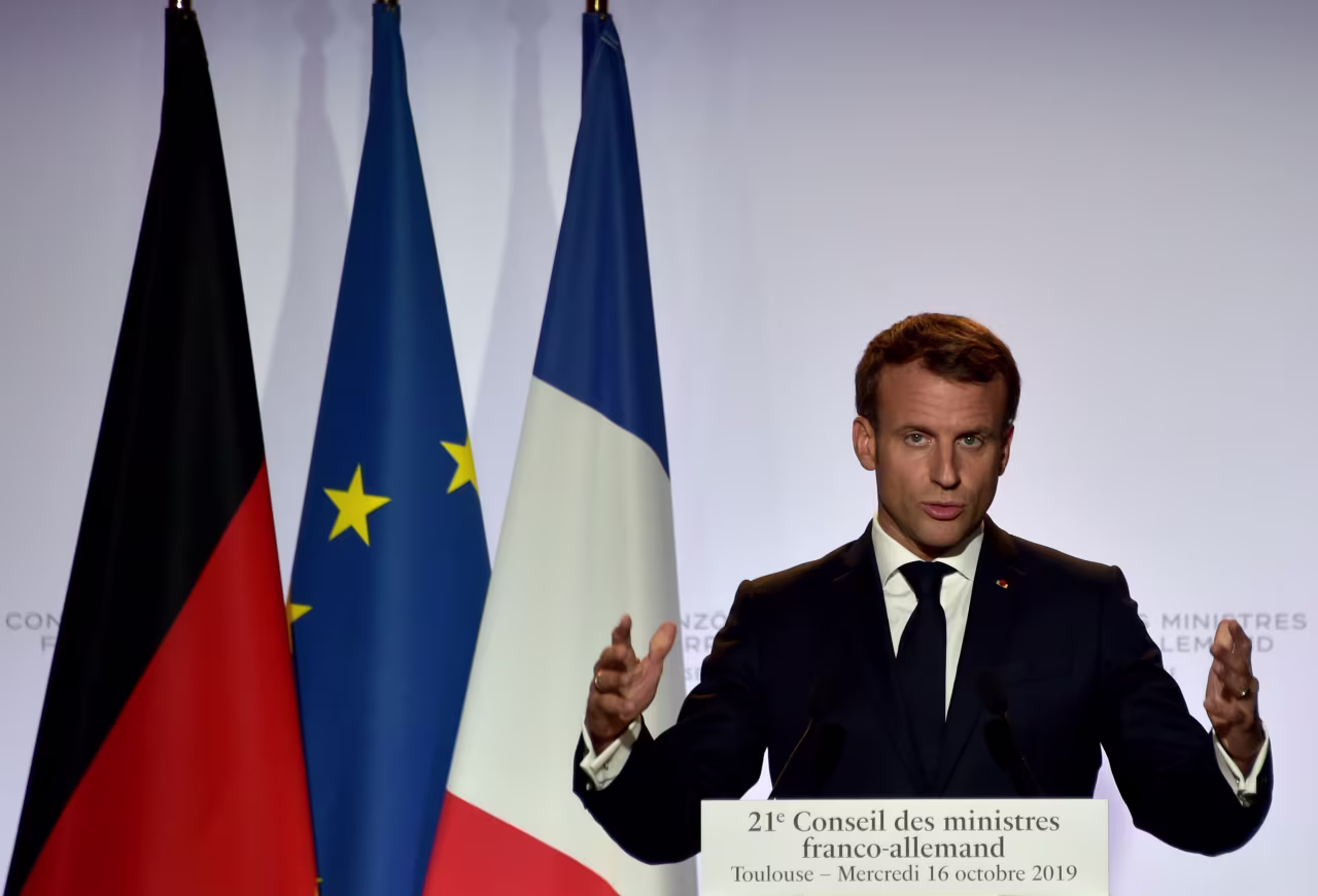 French President Emmanuel Macron during a press conference with German Chancellor Angela Merkel in Toulouse, southwestern France, on Thursday. 