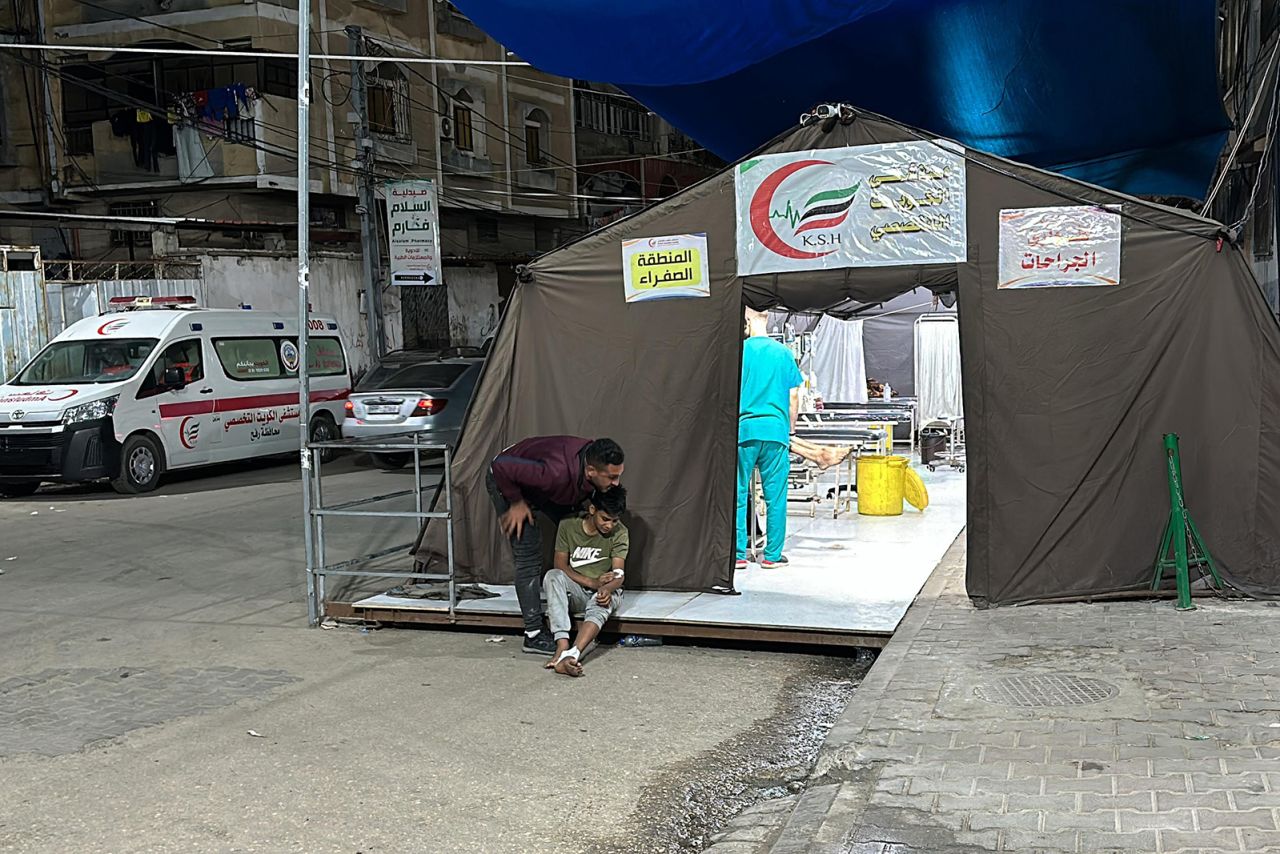 Palestinians injured after an Israeli airstrike wait for medical treatment in Rafah, Gaza on May 7.