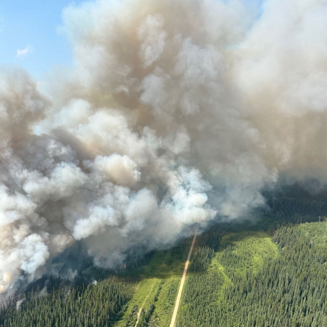 An aerial photo shows wildfire smoke rising over Jasper National Park, Alberta, Canada on July 24, 2024.
