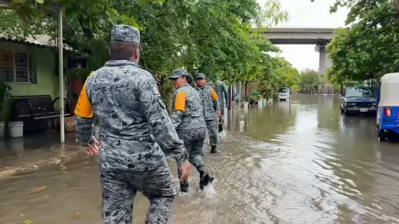 Hurricane Simon skirts Mexico's Pacific coast as resorts and vulnerable towns brace for impacts; Puerto Vallarta airport closed until Monday