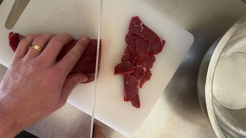 Preparing beef jerky.