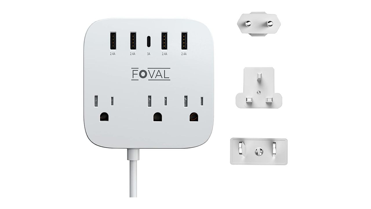 A photo of a white Foval European Travel Plug Adapter and its three included country adapters