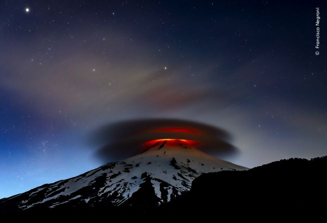 Francisco Negroni took this photo of a double lenticular cloud illuminated by lava at the Villarrica volcano in Chile.