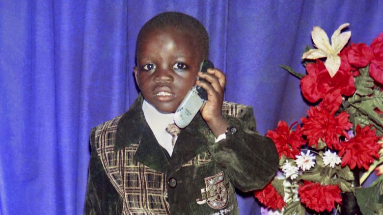 ftf-face-to-face-boy-in-suit-with-mobile.jpg