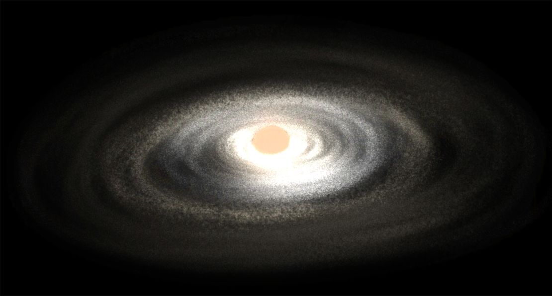 This illustration shows an eruption occurring in the swirling disk of matter around a newborn star.