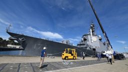 Crews in Japan practice loading a dummy Tomahawk munition aboard the Japan Maritime Self-Defense Force destroyer JS Chokai at Yokosuka Naval Base near Tokyo last week.