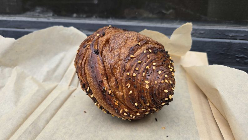 an everything croissant spiral on a piece of craft paper