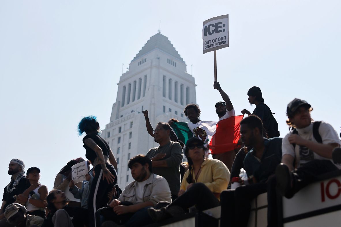 People gather during a protest outside a federal building on Monday.