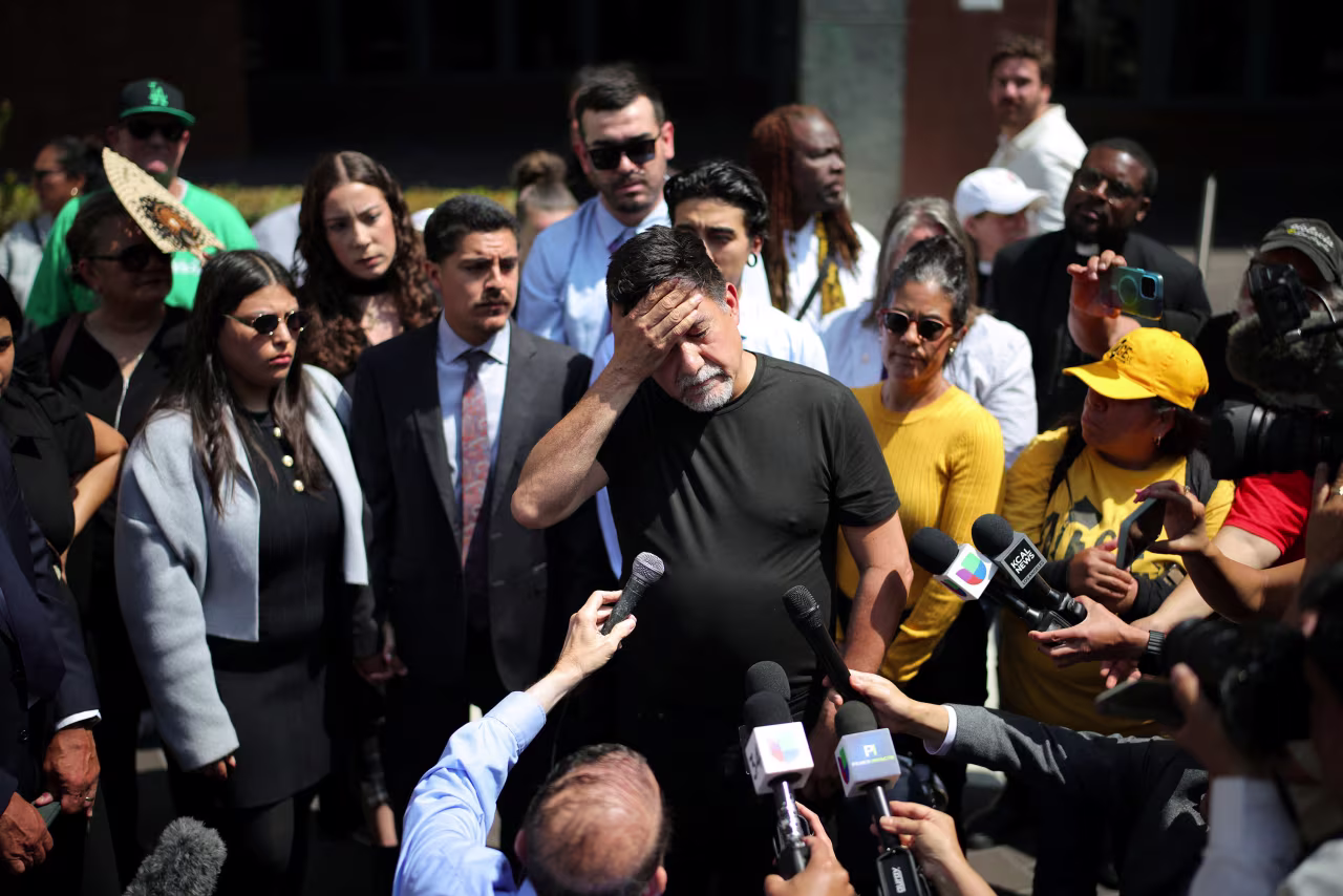 SEIU California and SEIU-USWW union president David Huerta reacts as he speaks to the media after his release from detention outside the Edward R. Roybal Federal Building.