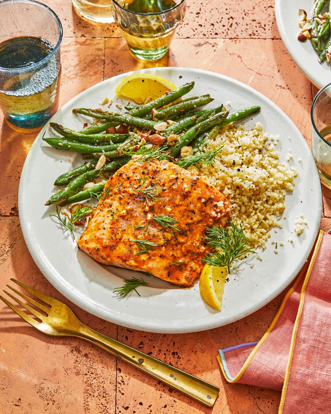 Pair Karadsheh's Garlic and Dijon Baked Salmon with asparagus and a whole grain such as quinoa.