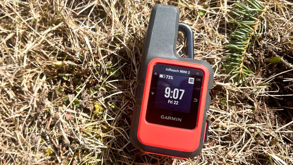 The Garmin inReach Mini 2 on grass.