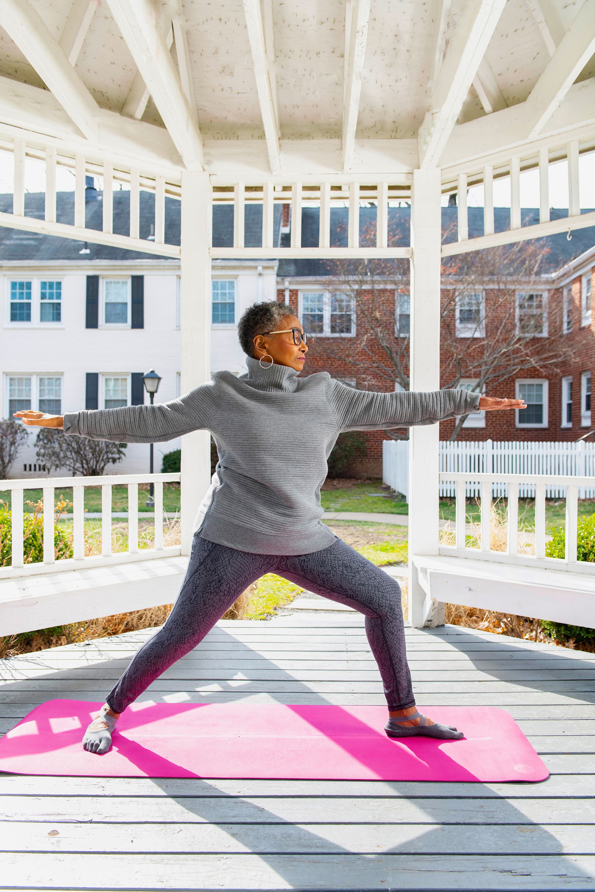 Yoga instructor Gayle Fleming, 76, strikes a warrior pose.
