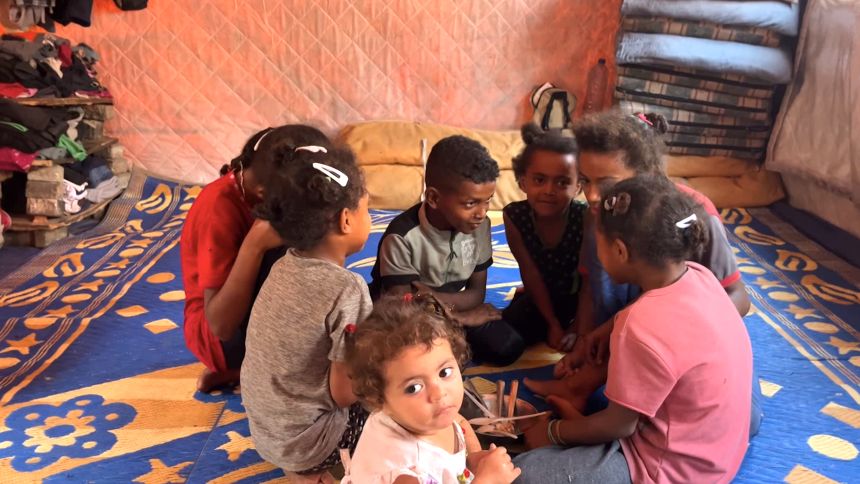 Um El-Abed has eight children to feed. A bowl of soup is hardly enough.
