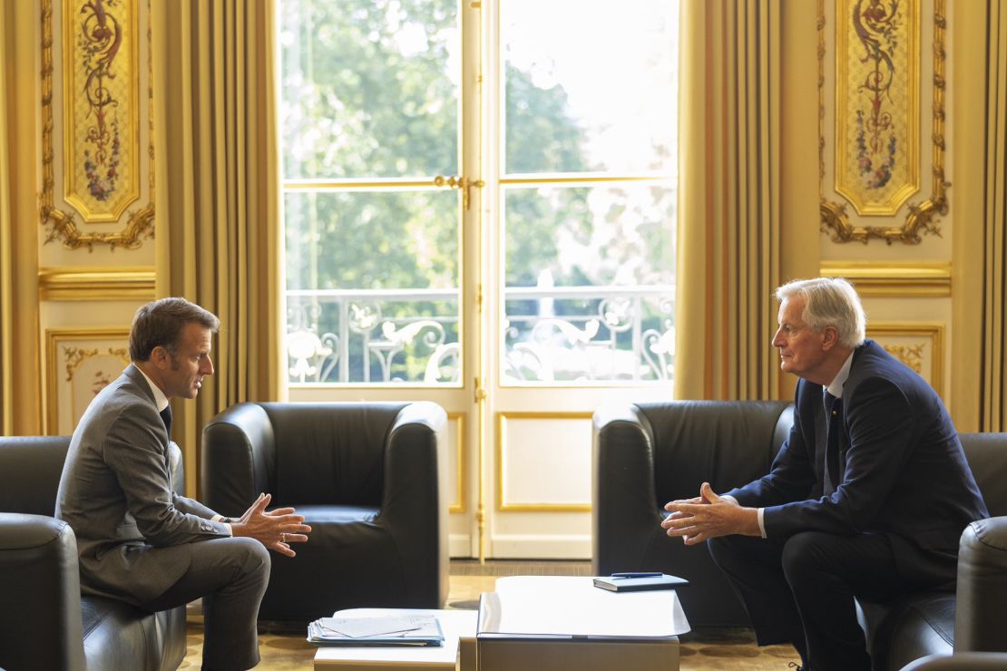 Macron meeting with Barnier in a picture shared on the president's social media channels Thursday. Macron thanked Barnier in his televised address, attacking left and right-wing lawmakers who united to oust him.