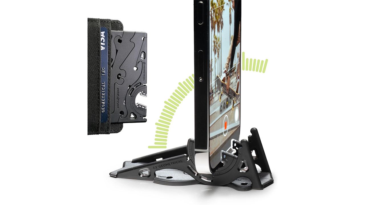 A photo of the Geometrical Smartphone Tripod in a wallet and holding a phone