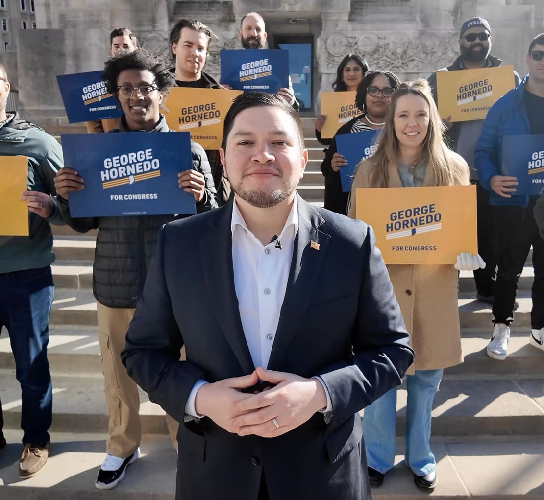 Democratic congressional candidate George Hornedo, center.