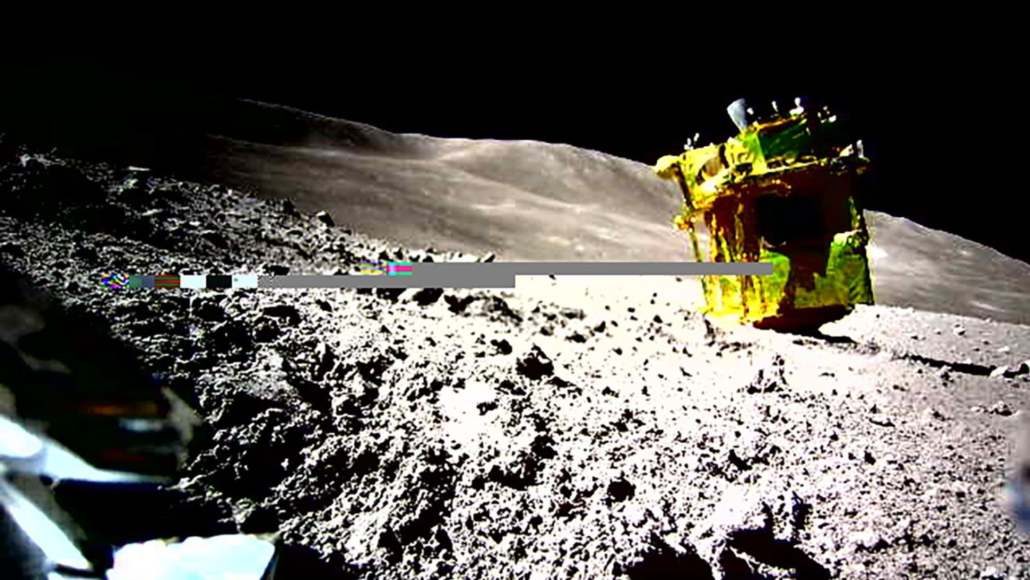 An image taken by the Lunar Excursion Vehicle 2, a miniature rover that accompanied Moon Sniper on its journey, shows the sideways orientation of the spacecraft on the lunar surface.