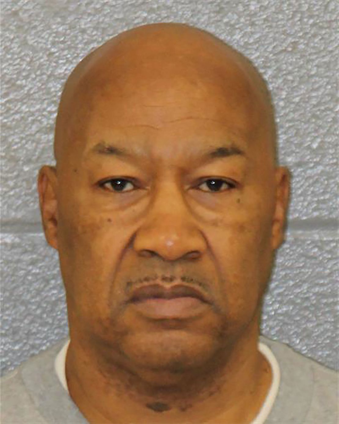 Herbert Stanback was charged in connection with Ruth Buchanan's December 1989 death, authorities said.